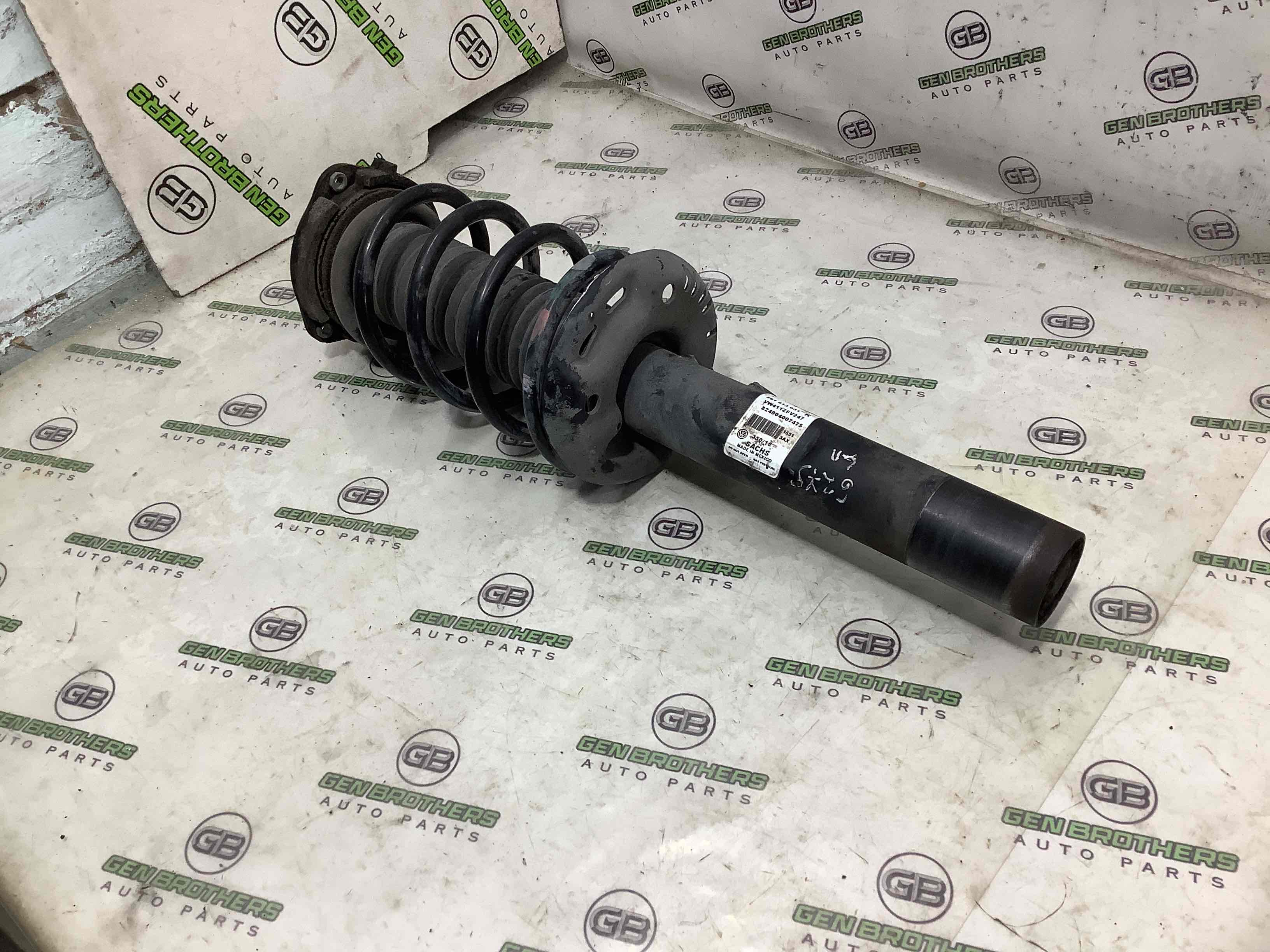 Амортизатор передній лівий