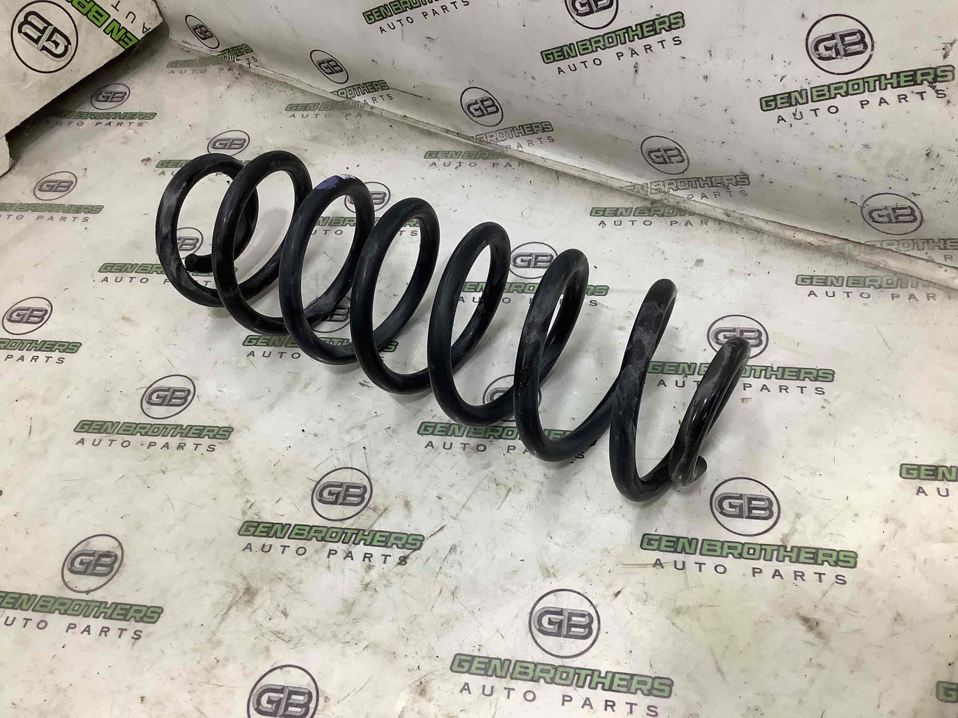 Пружина задня