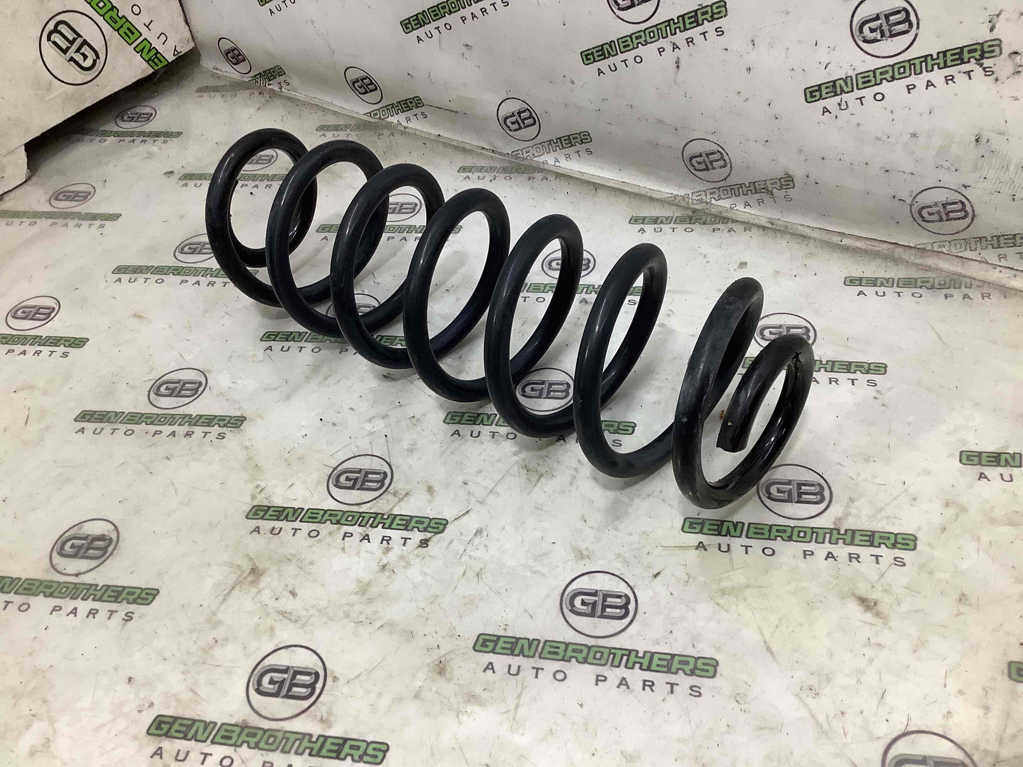 Пружина задня