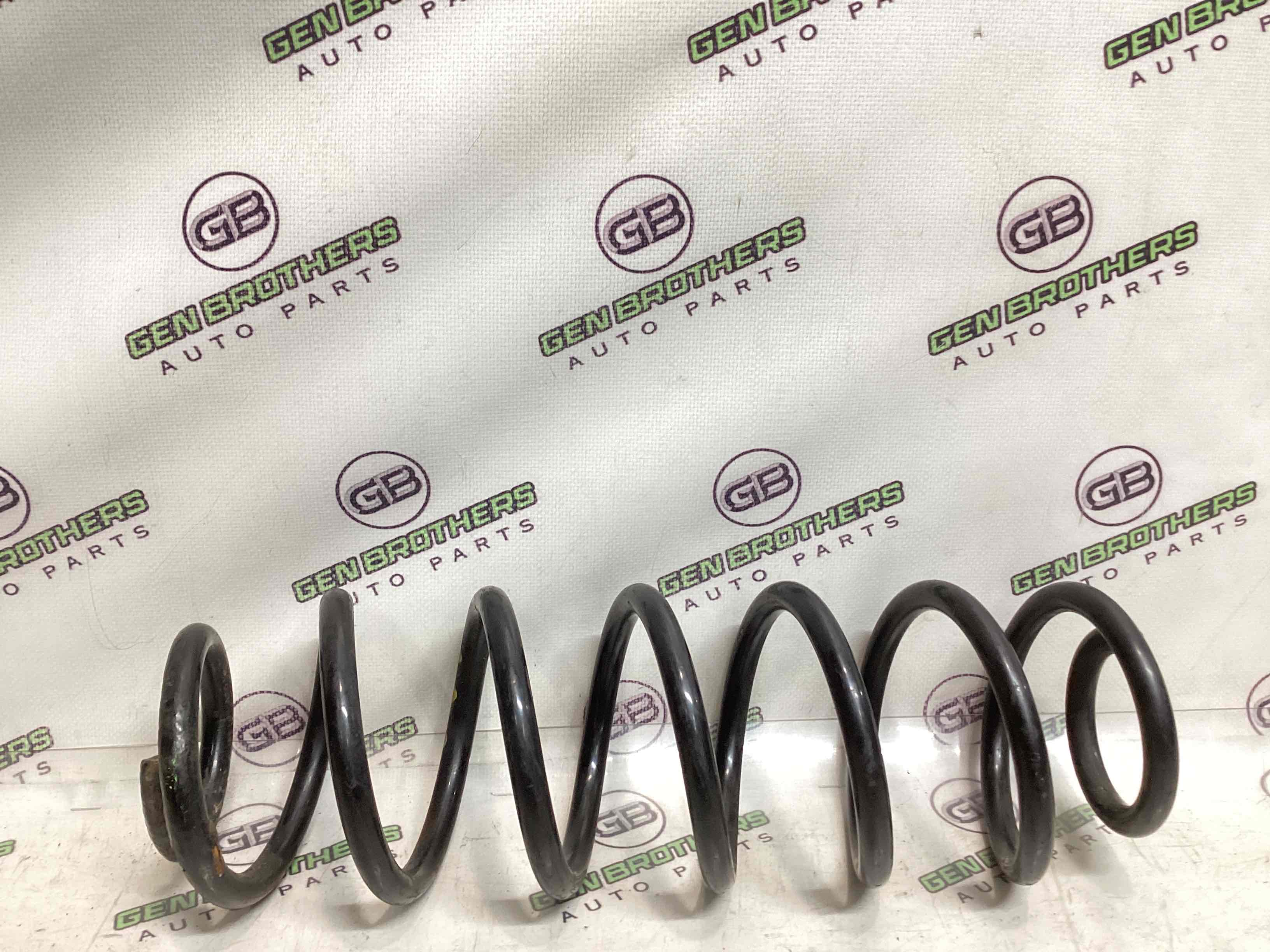 Пружина задня