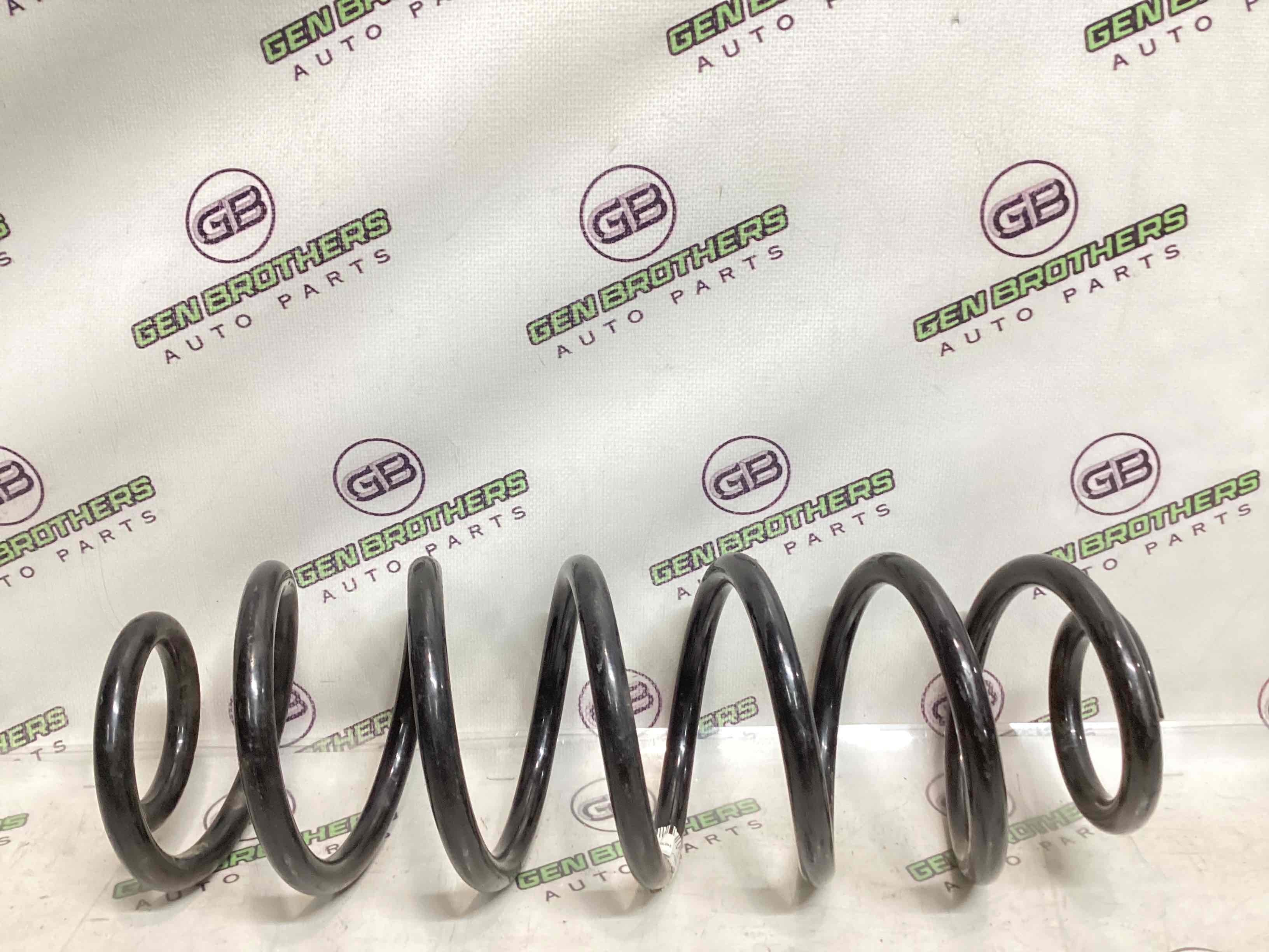 Пружина задня