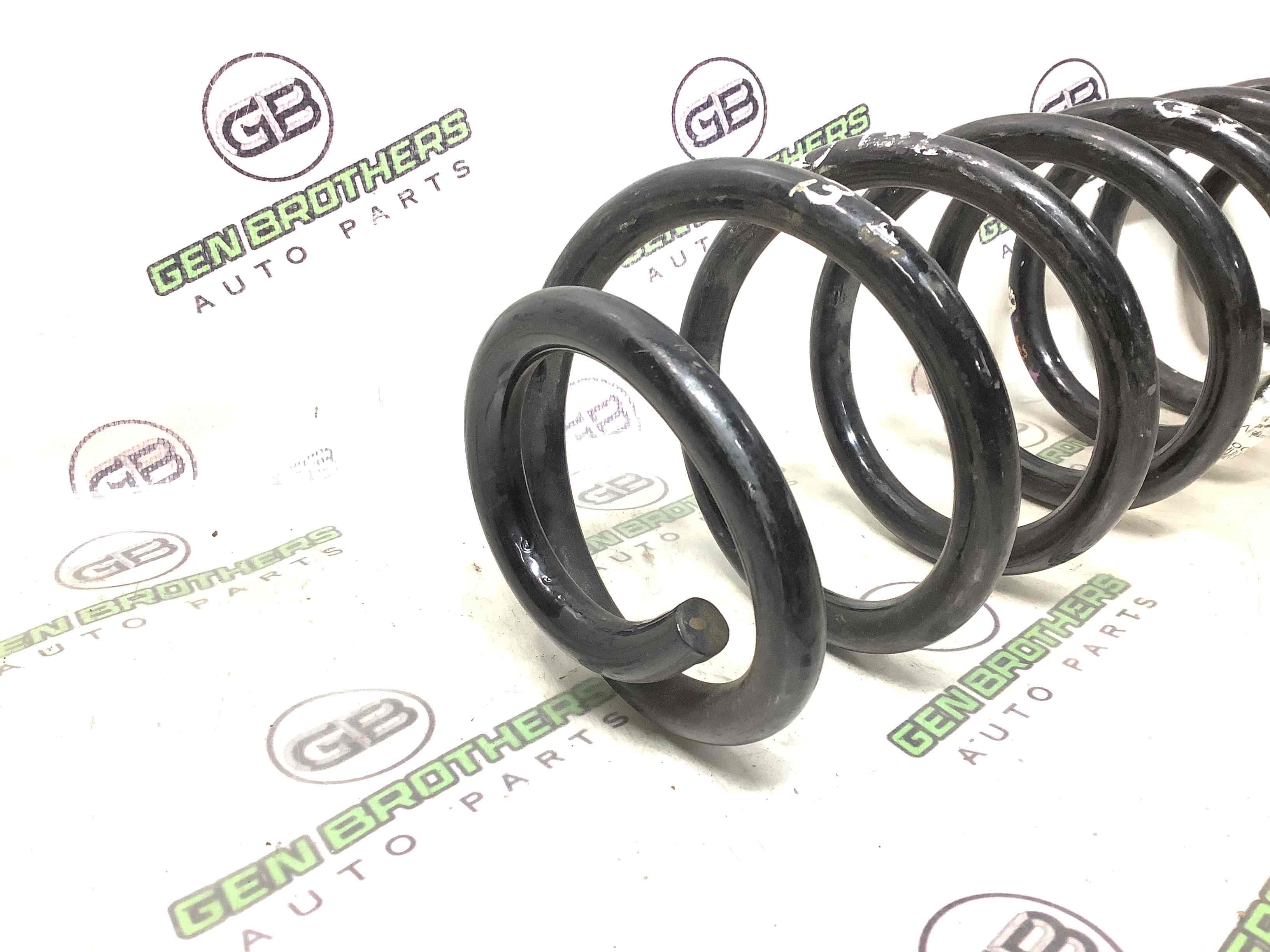 Пружина задня