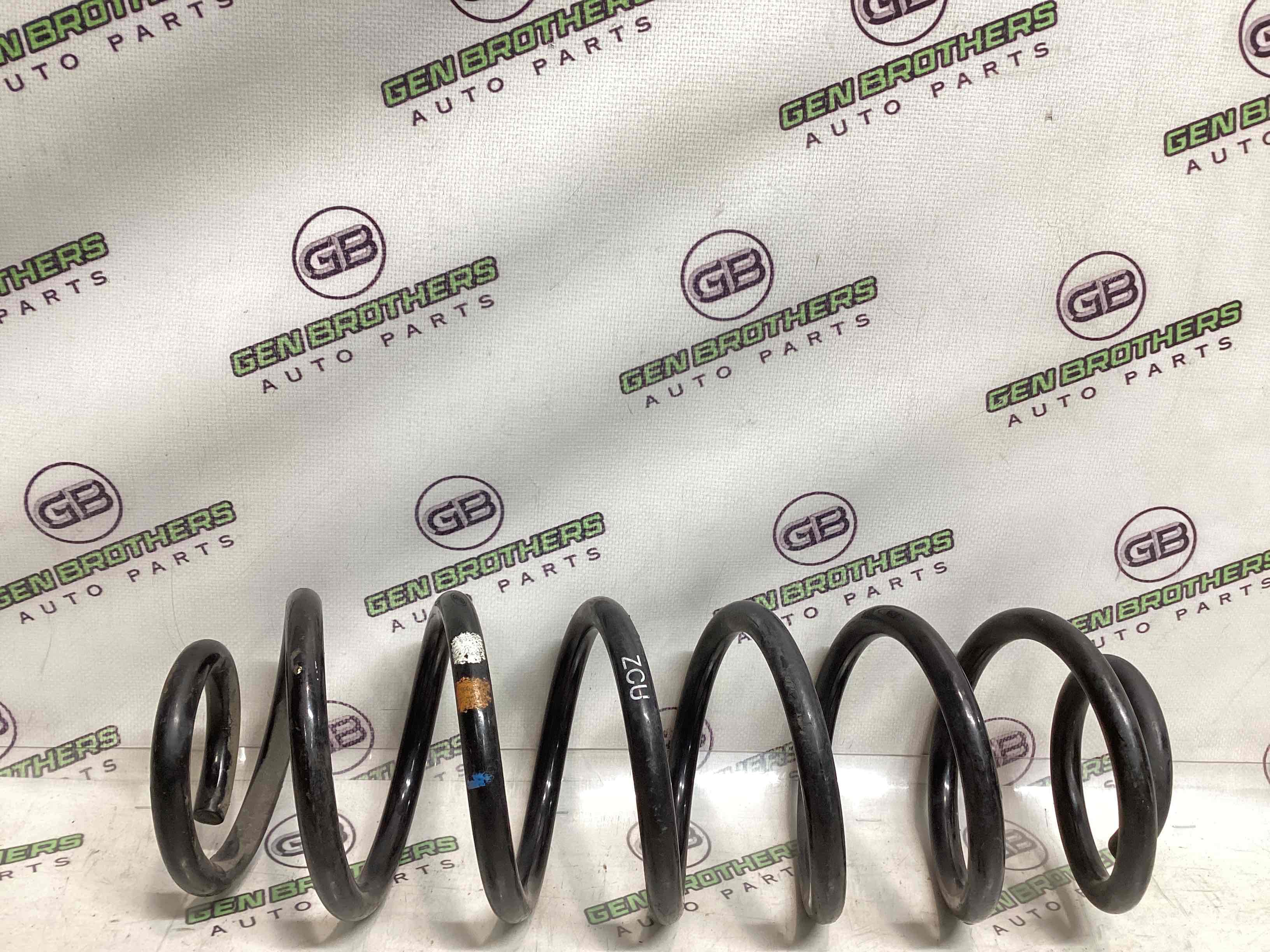 Пружина задня