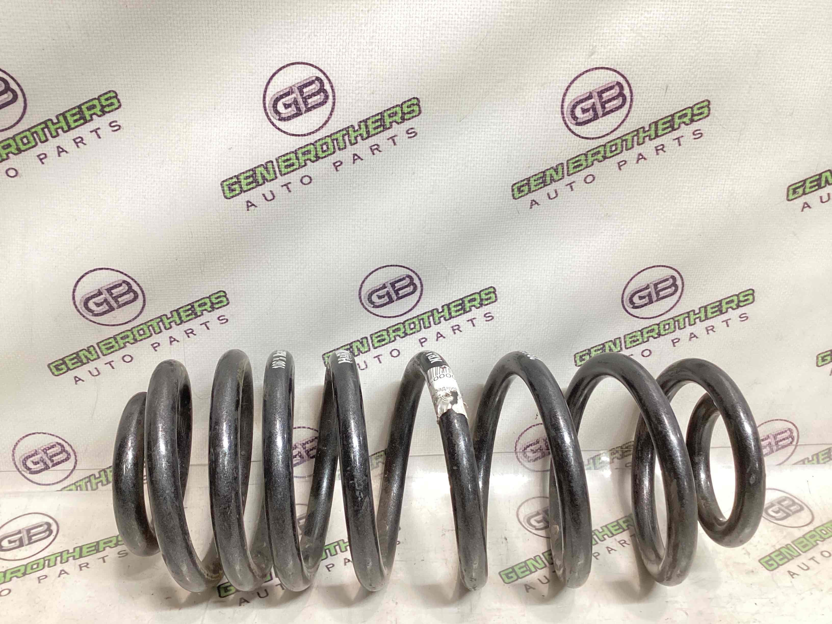 Пружина задня