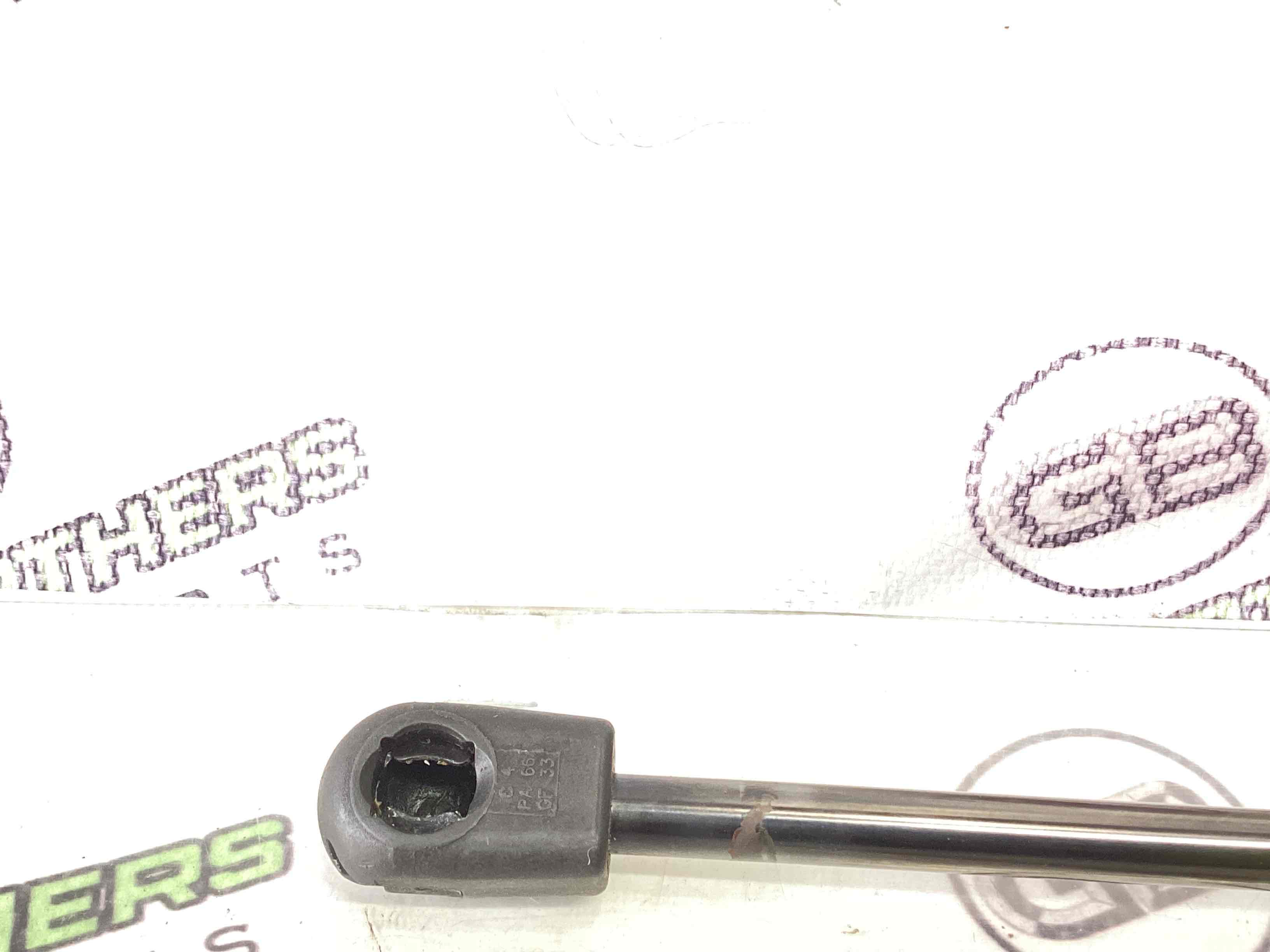 Амортизатор кришки двері багажника