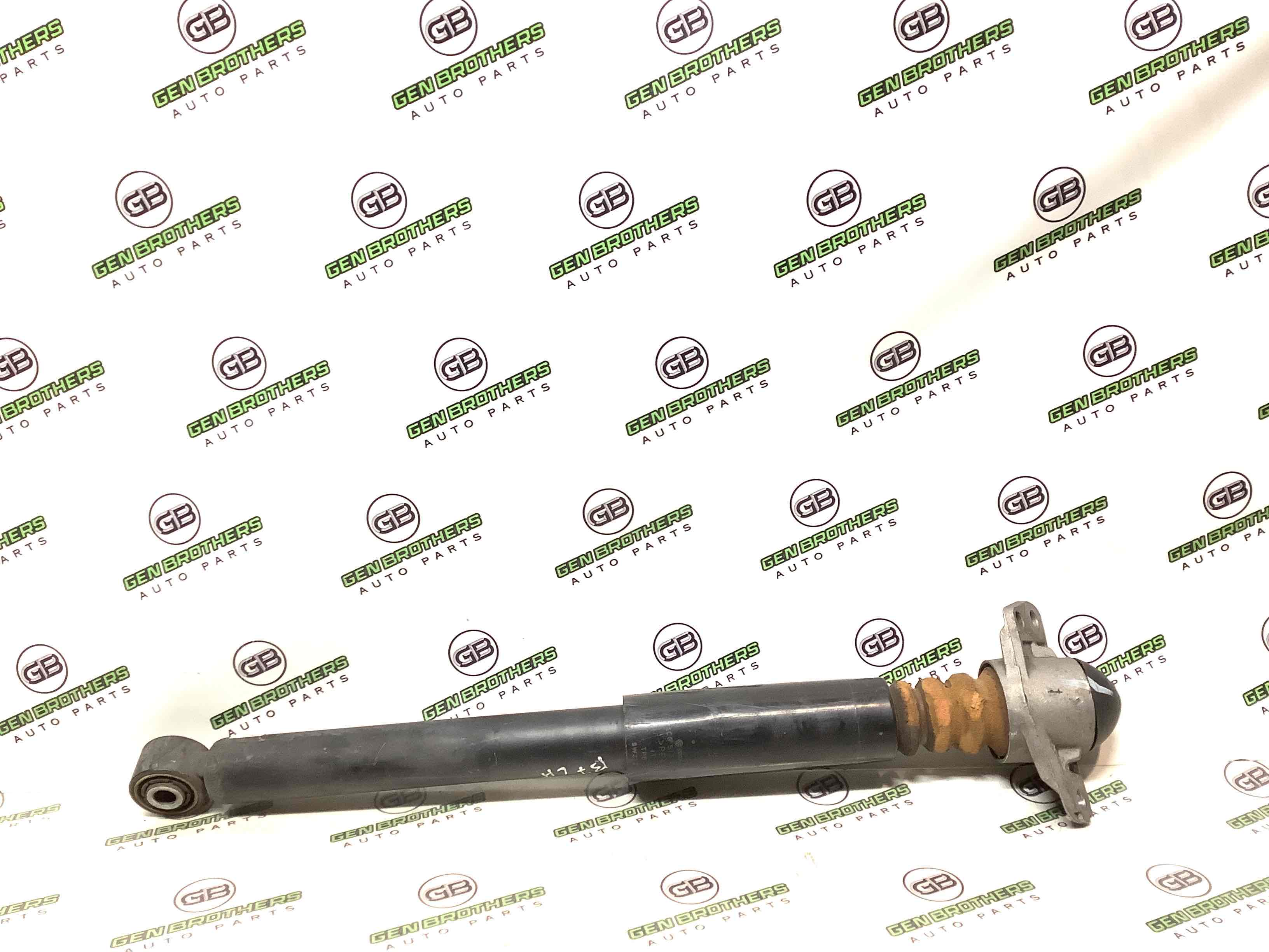 Амортизатор задній лівий