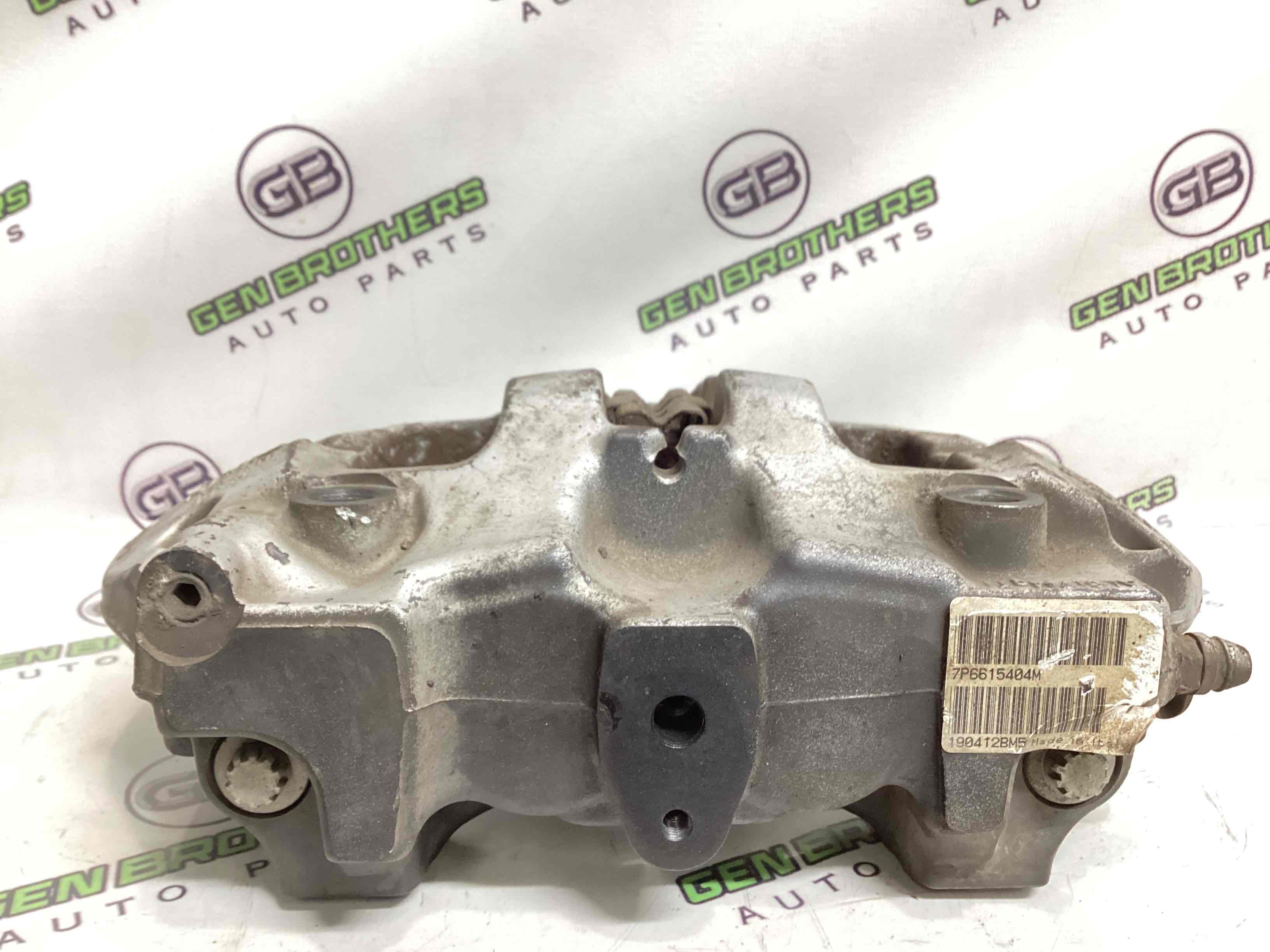 Супорт задній правий