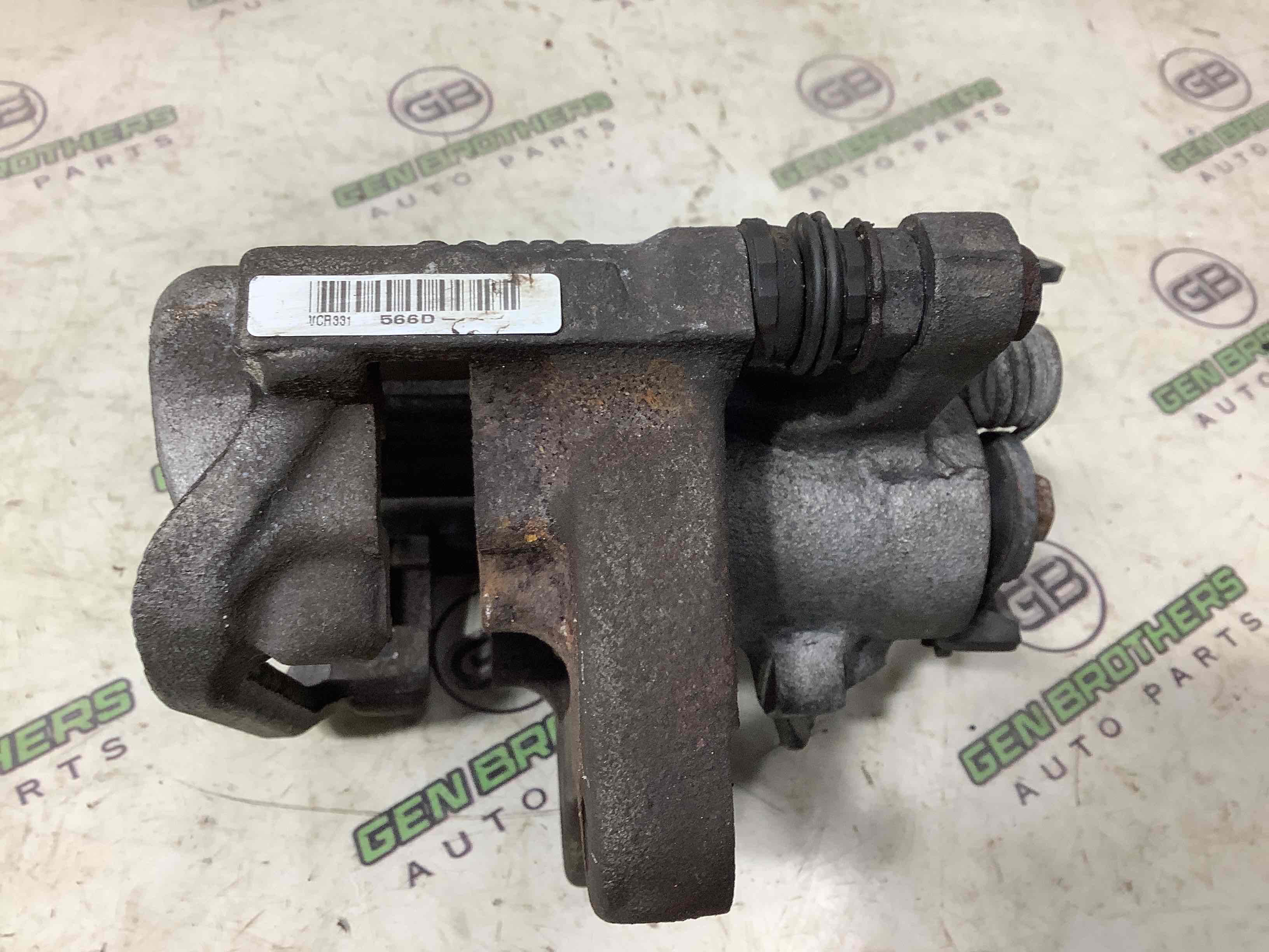 Супорт задній правий