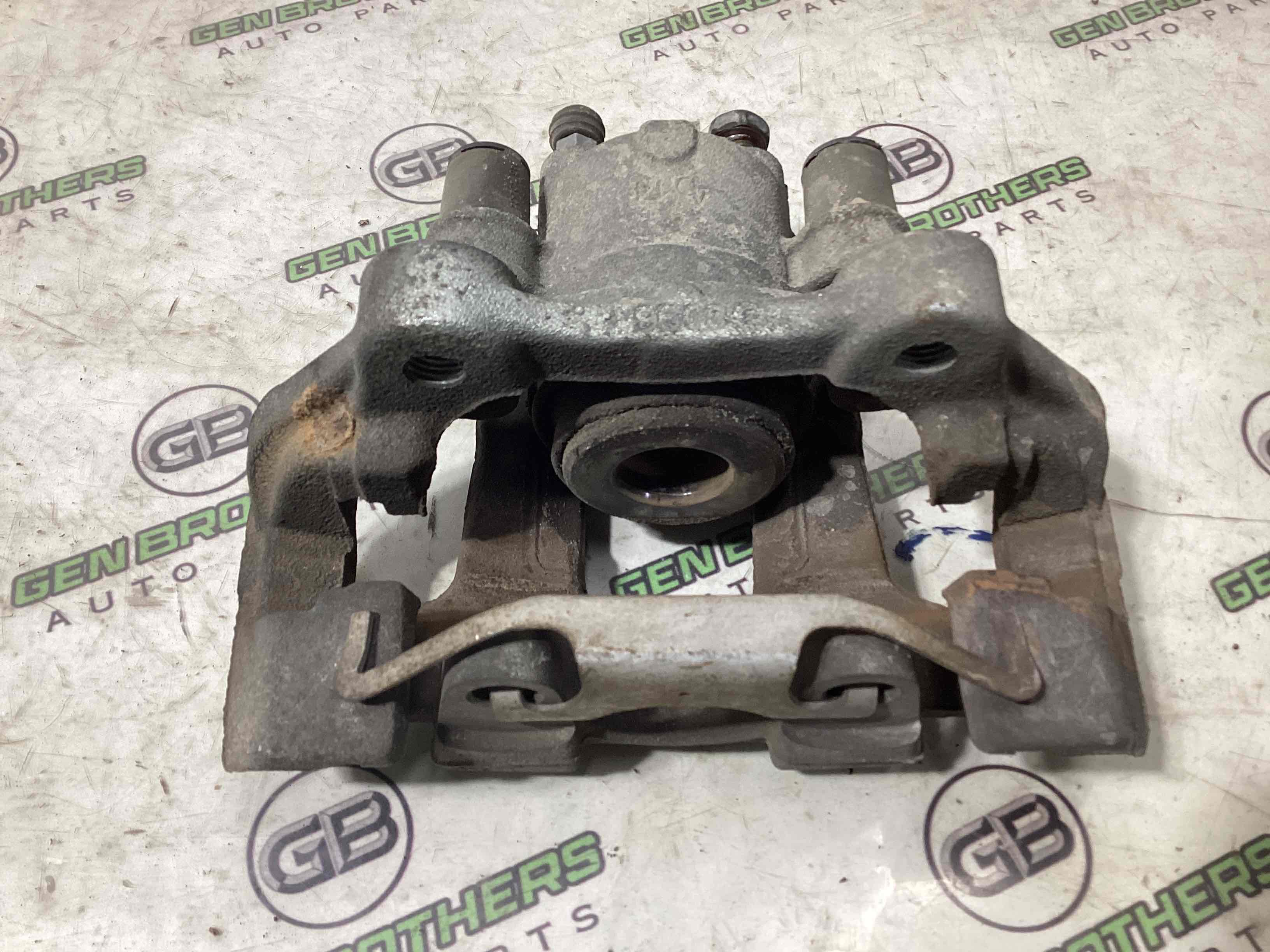 Супорт задній лівий