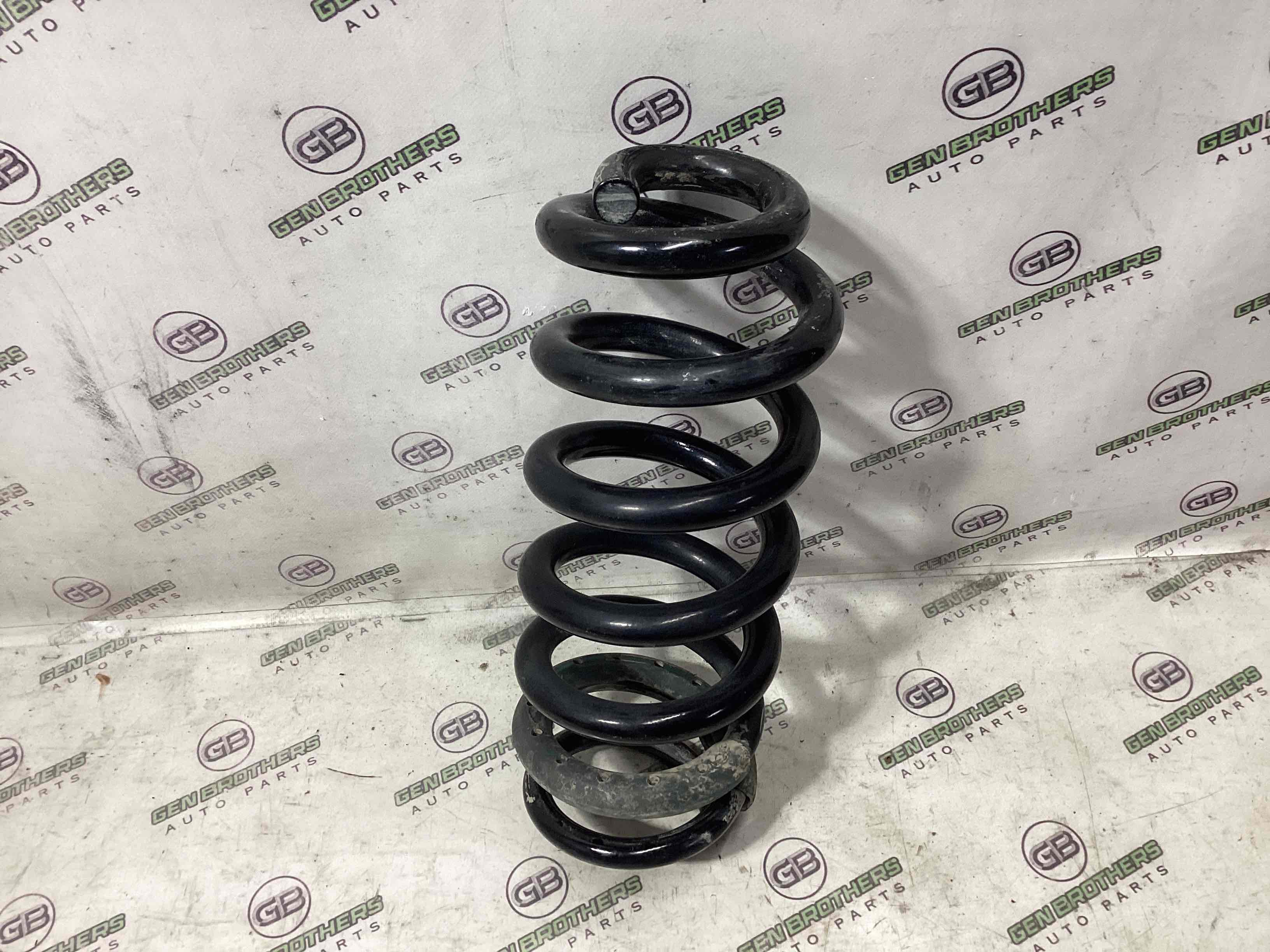 Пружина задня