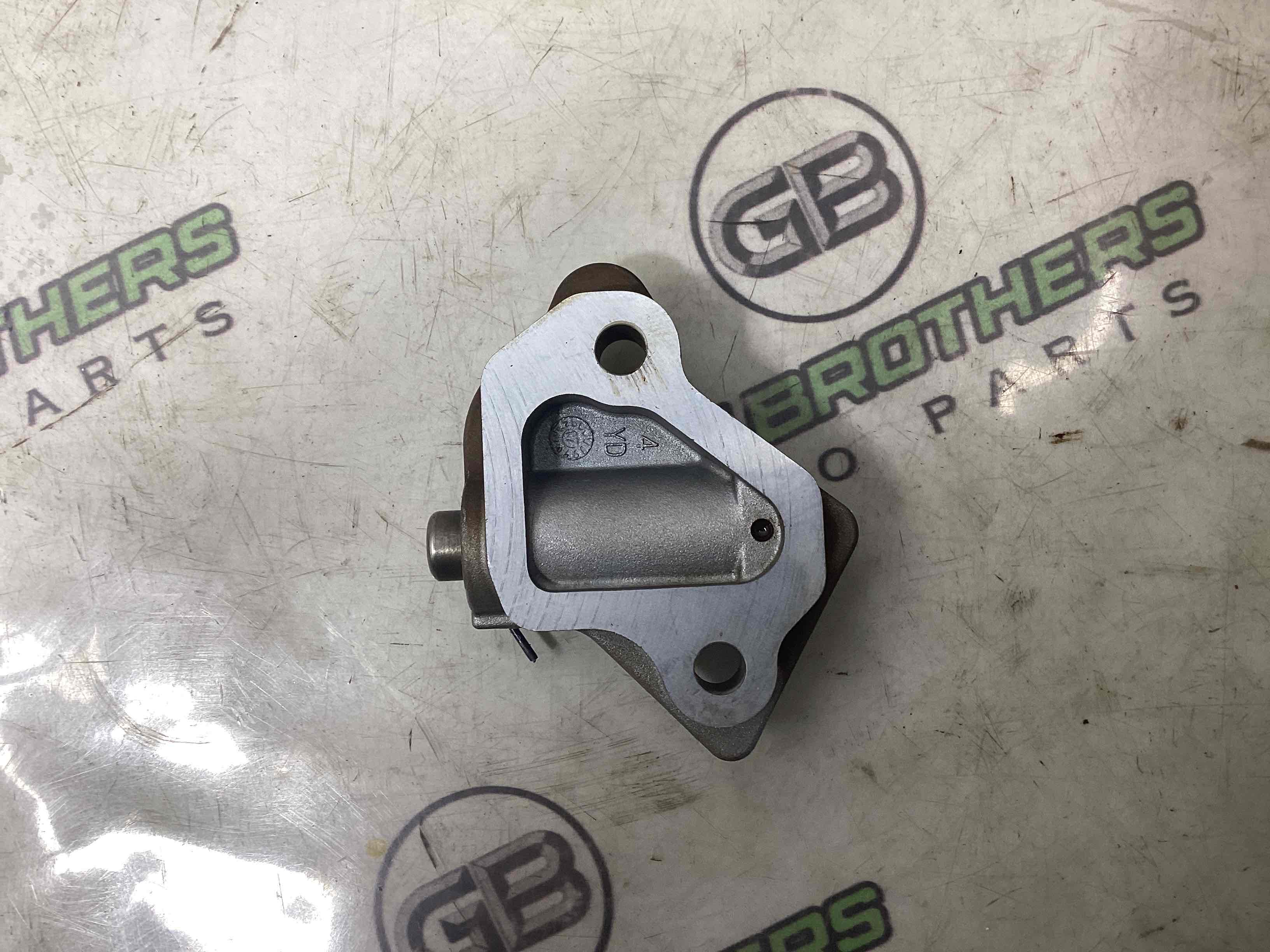 Механізм натягу ременя, ланцюга, ролика