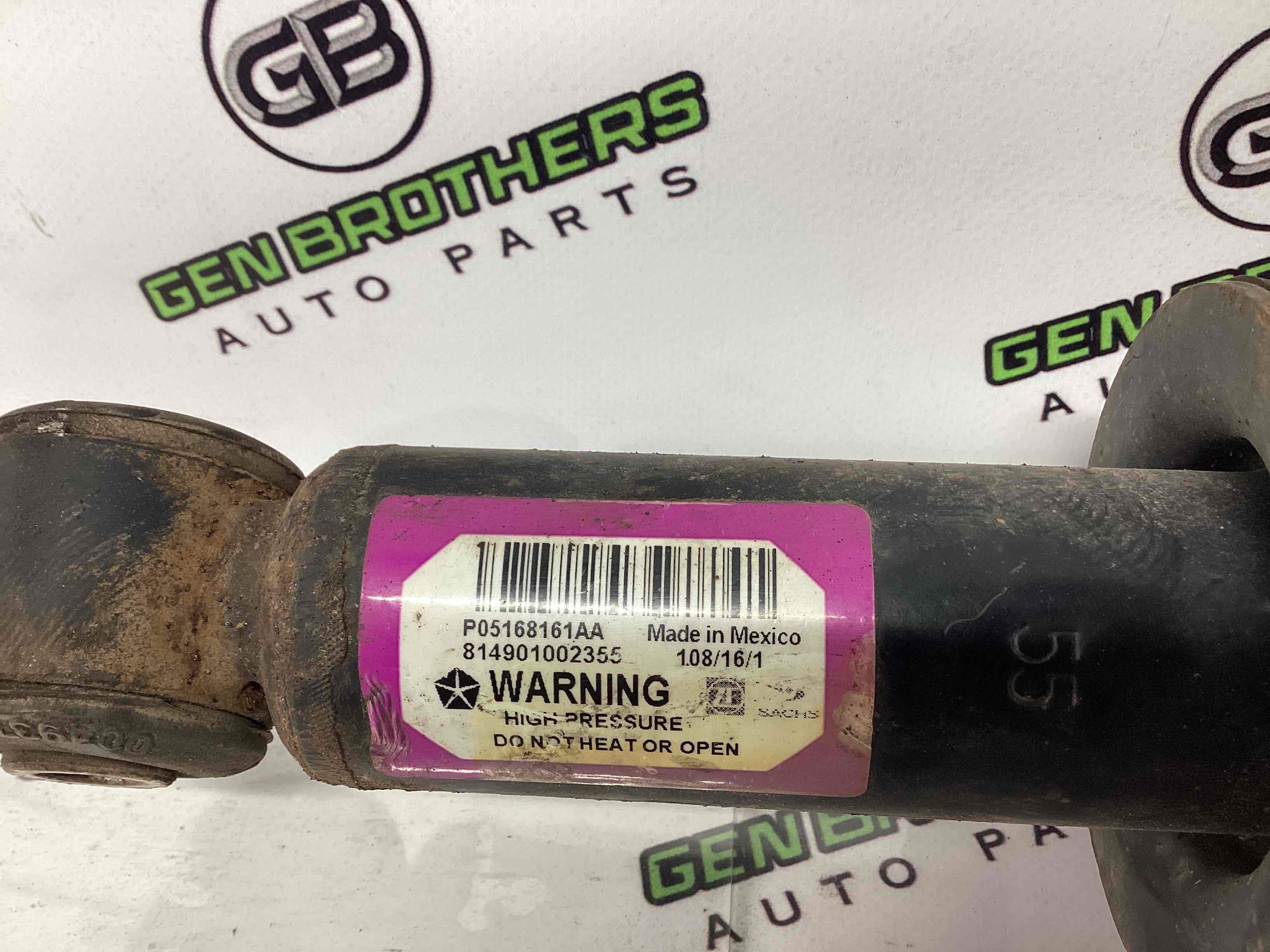 Амортизатор задній лівий