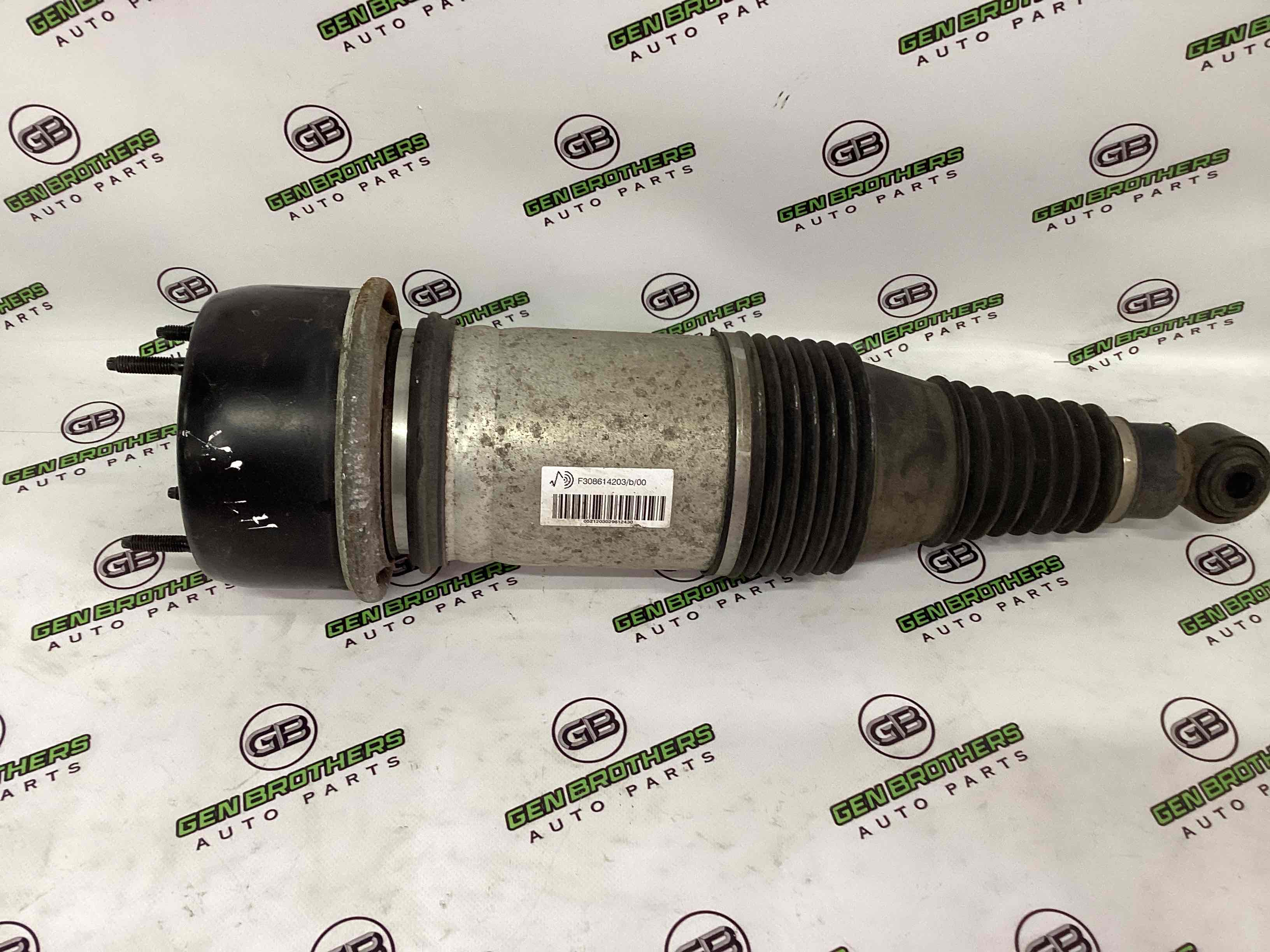 Амортизатор задній лівий