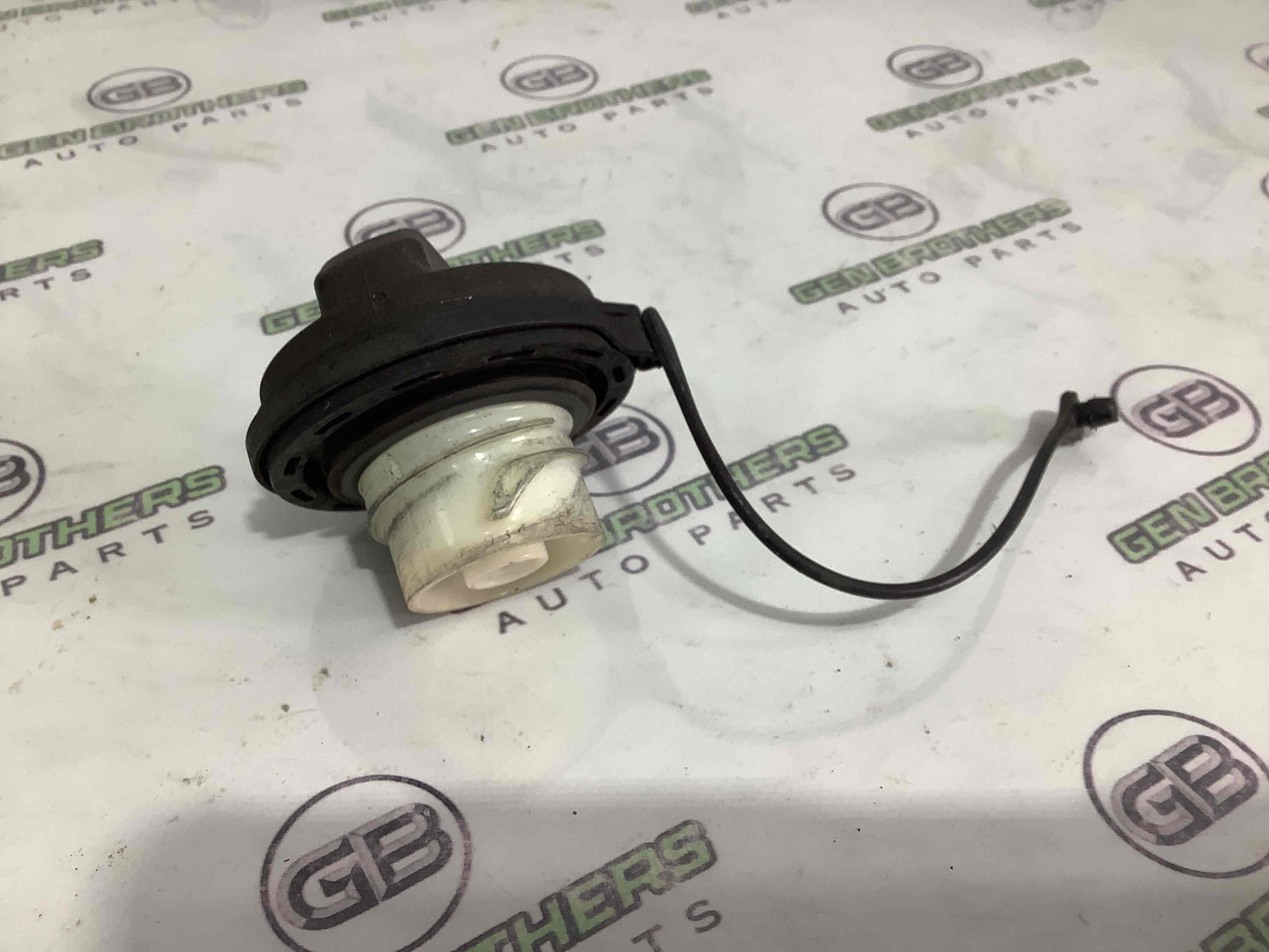 Корок бака, кришка заливної горловини, дотяжка