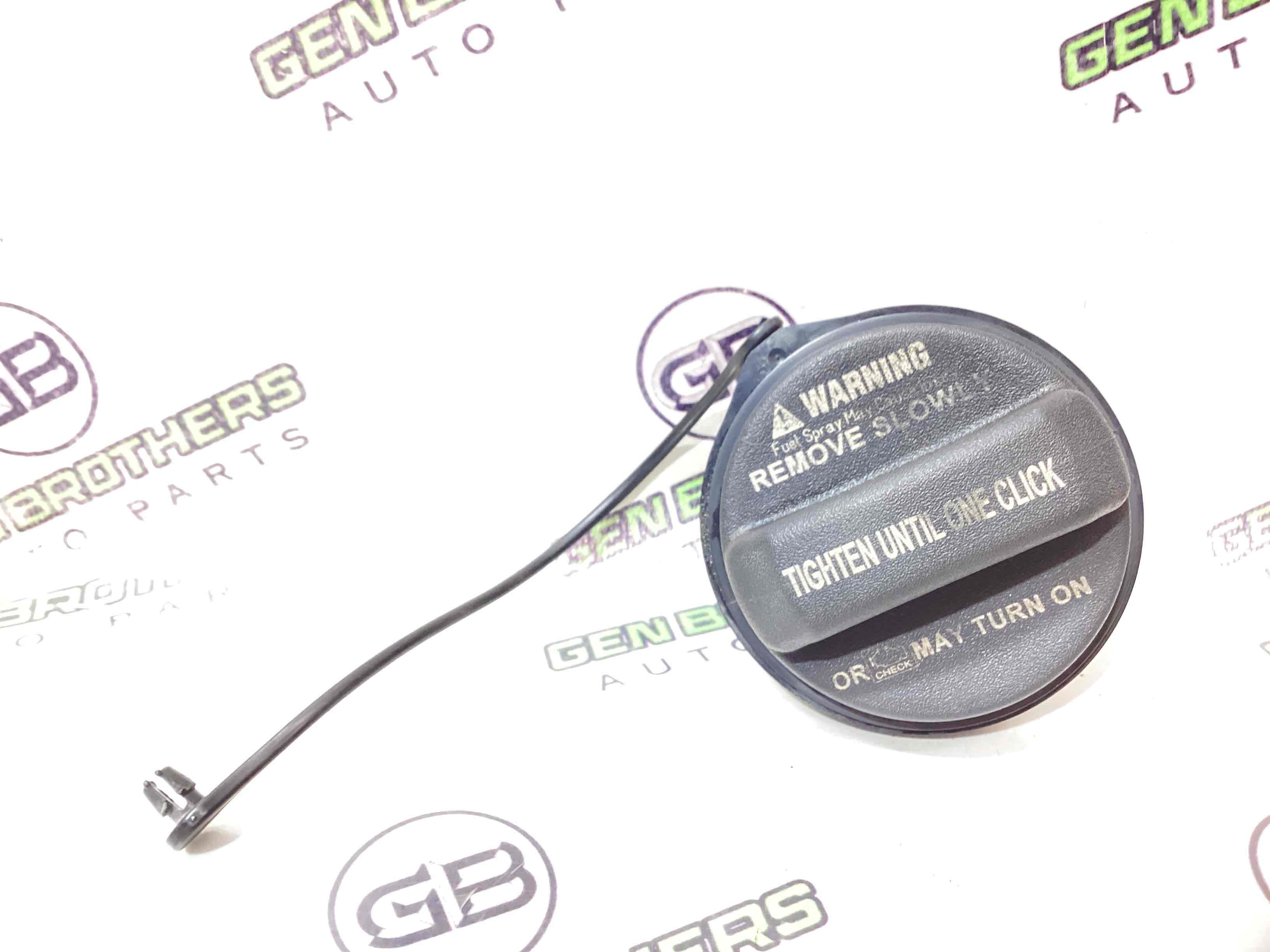 Корок бака, кришка заливної горловини, дотяжка