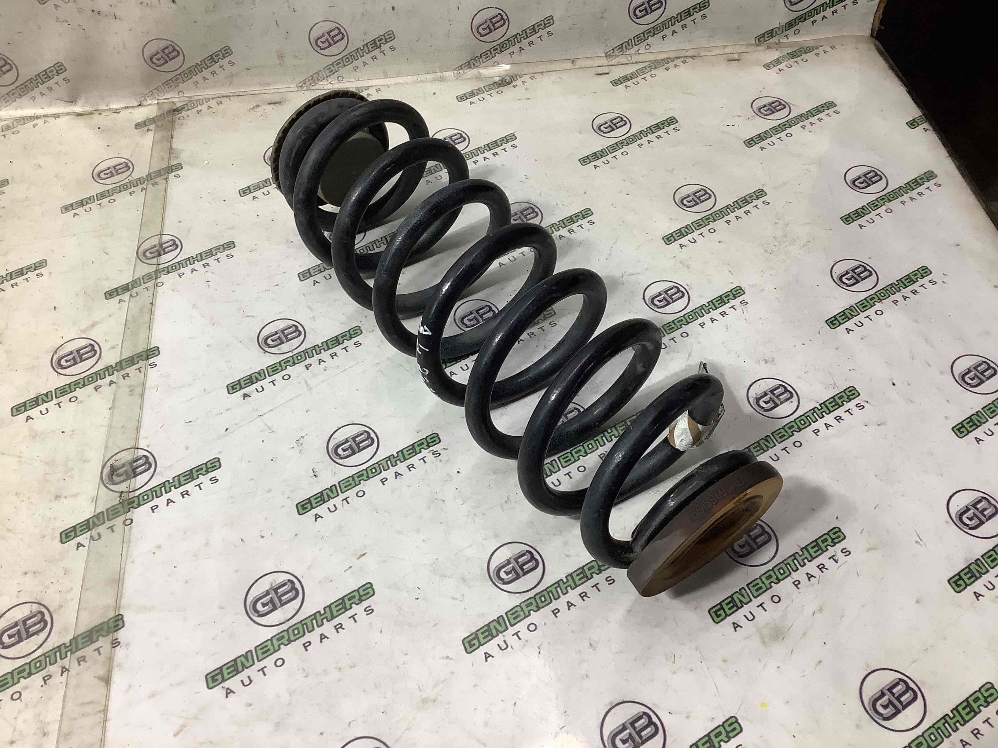 Пружина задня