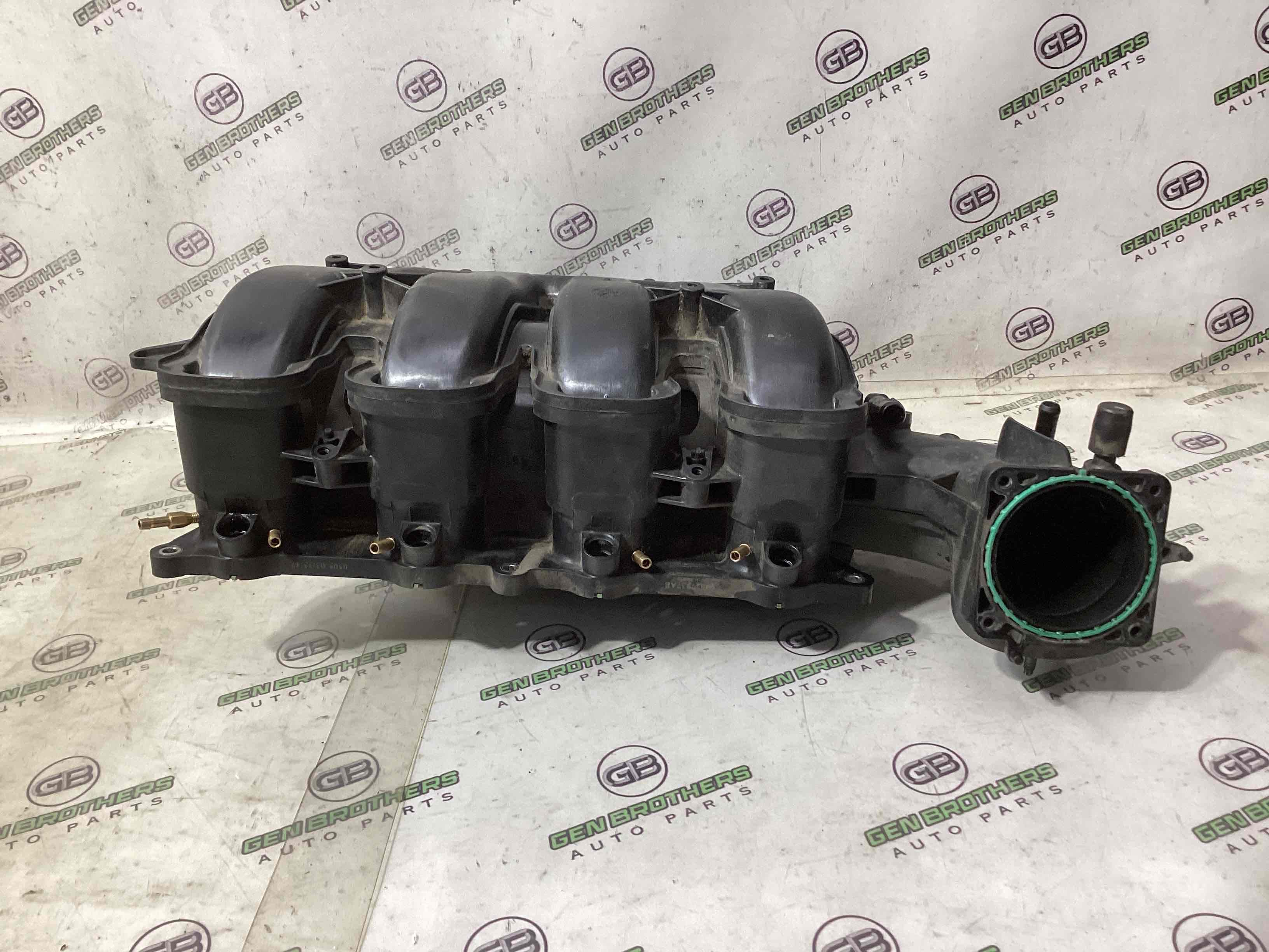 Колектор впускний