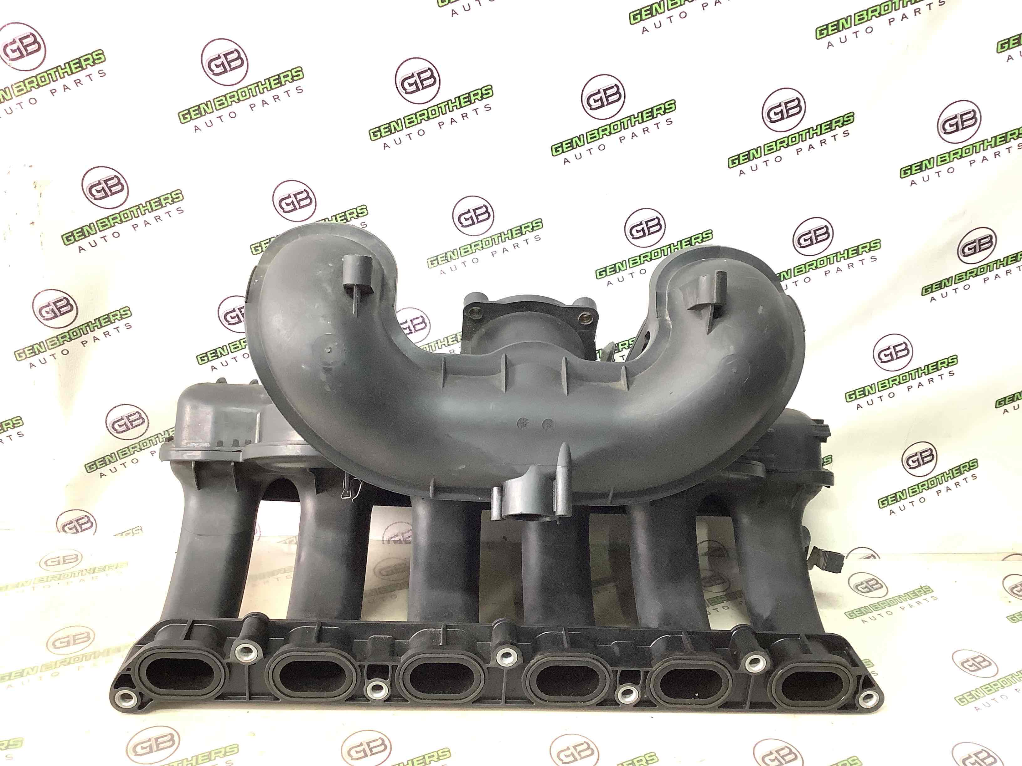 Колектор впускний