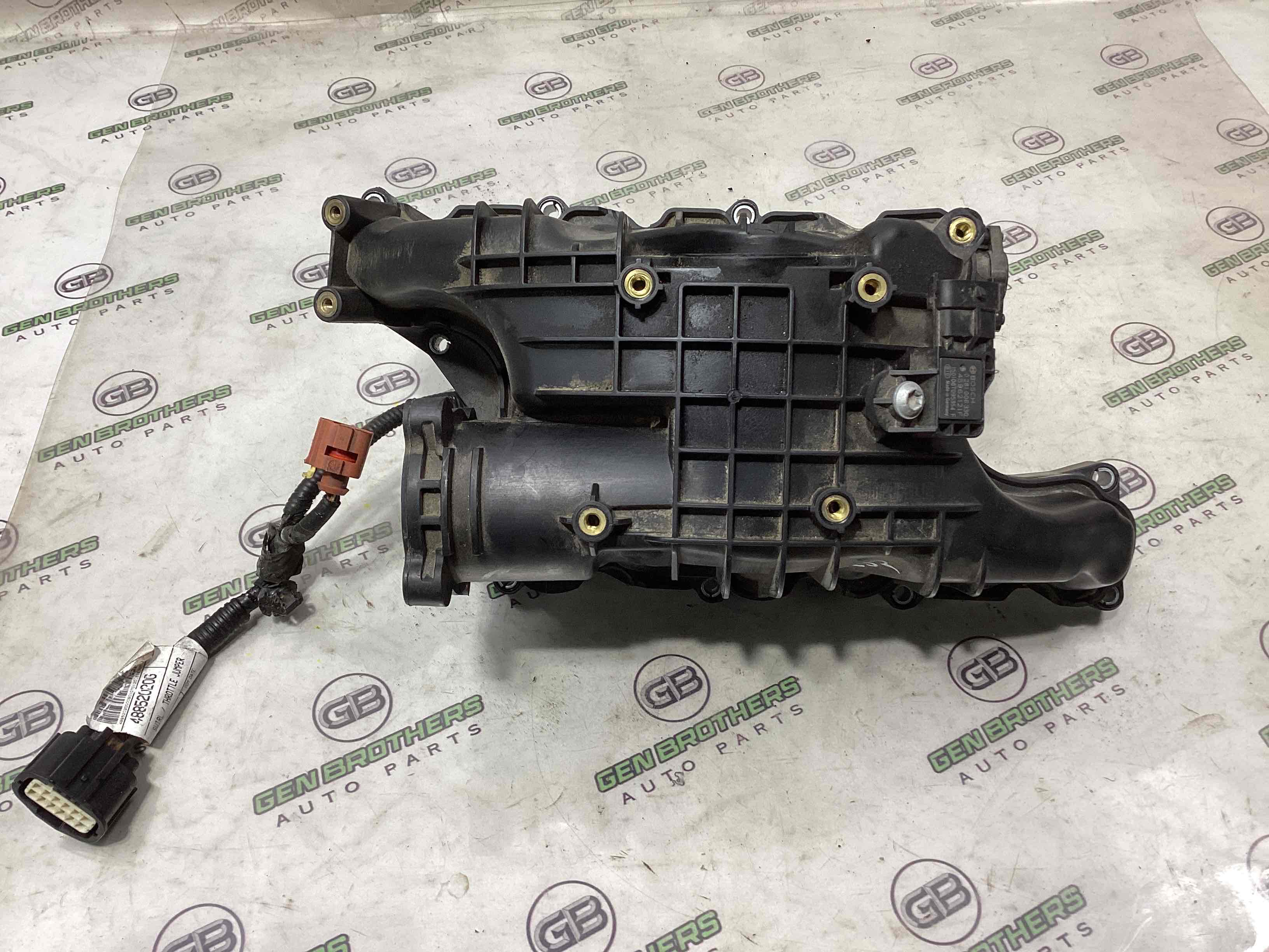 Колектор впускний